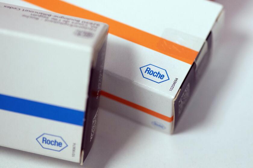 The logo of Swiss drugmaker Roche on a pack of the drug, on May 05, 2020 in Paris, France.Photo by David NIVIERE/ABACAPRESS.COM