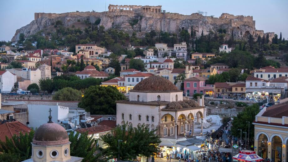 Night view of Monastiraki Square and the Acropolis in Athens, Greece