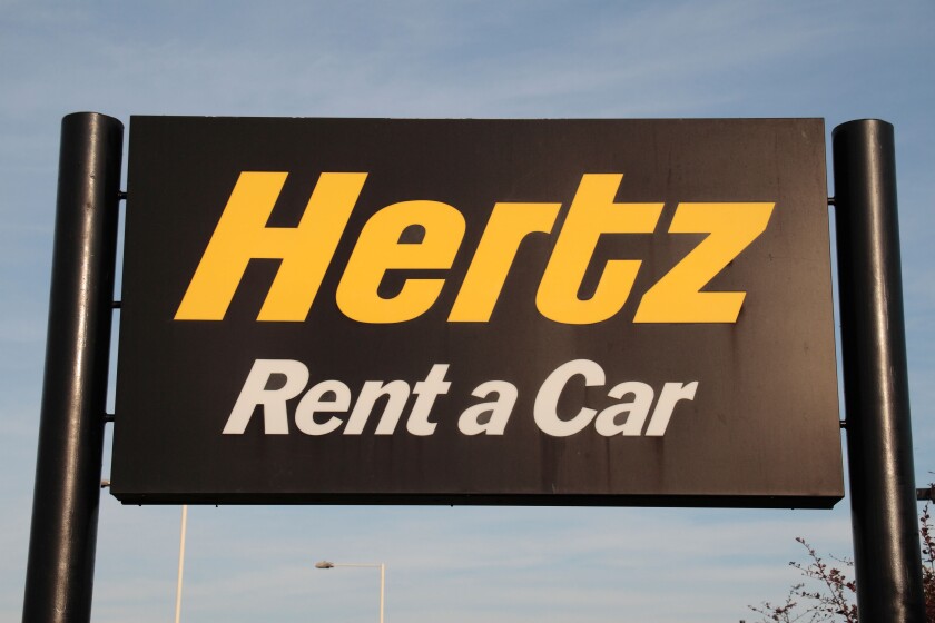 A Hertz Rent a Car sign close to Heathrow Airport, London, UK.