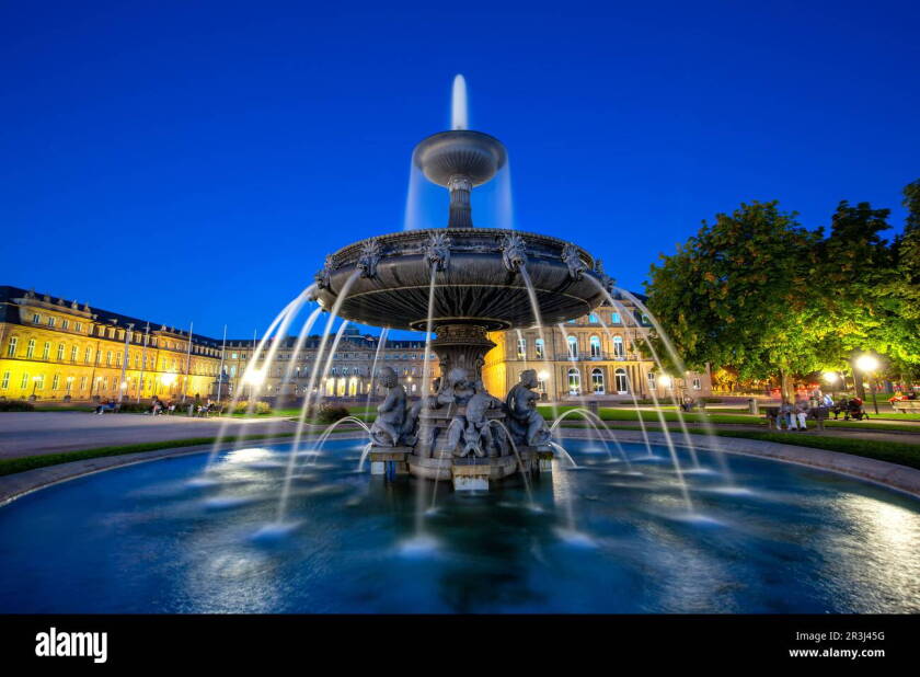 Stuttgart Schlossplatz with fountain and Neues Schloss travel by night in Germany