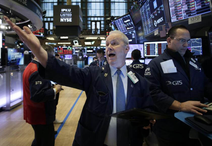 New York, United States. 12th Mar, 2020. Traders work on the the floor of the New York Stock Exchange at the opening bell on Wall Street in New York City on Thursday, March 12, 2020. U.S. stocks recovered some of their steep losses on Thursday after the F