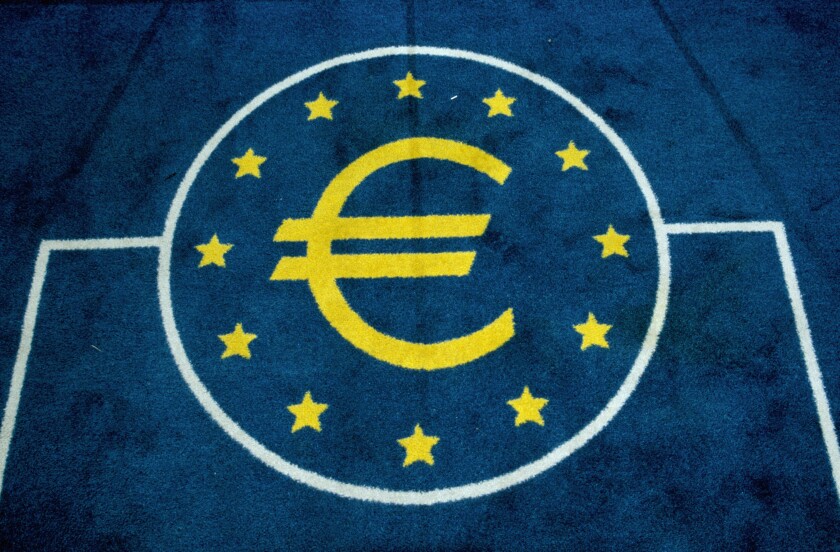 ? Euro symbol woven into lift carpet, ECB, Frankfurt, Germany.. Image shot 2006. Exact date unknown.