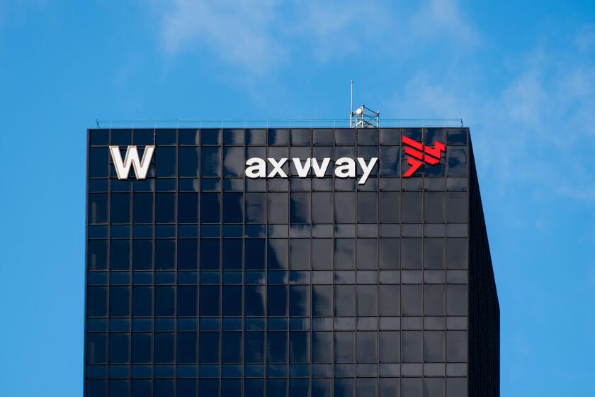 Exterior view of the headquarters of Axway Software France, an information technology company located in the W tower of the Paris-La Defense