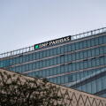 Building of the BNP Paribas bank in the capital city of Germany. Architecture with a lot of glass on the facade. Financial investment business.