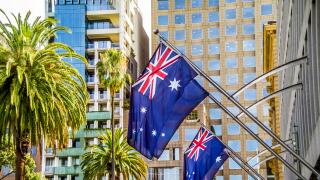 Australian flags outside Department of Justice Building Spring Street Melbourne Australia