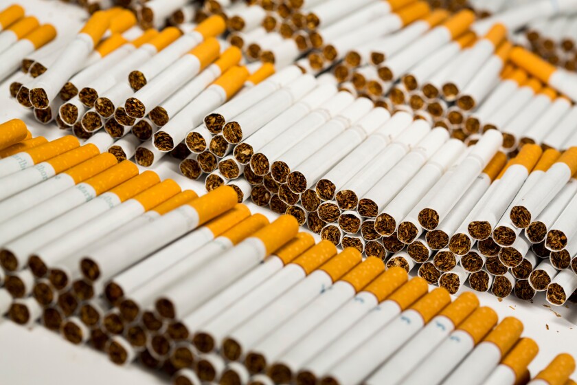 Various loose cigarettes. Marlboro, Pall Mall, Winston, Camel, Parliament, Newport, American Spirit. 