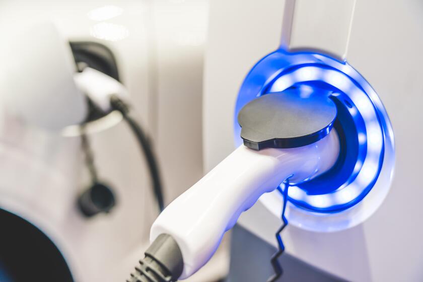 Electric Vehicle charging station system storing power on white modern car. EV fuel advanced hybrid car. automobile industry new technology concept.