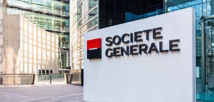 Sign of the Societe Generale at the entrance of the head office of the french banking group in La Defense business district.