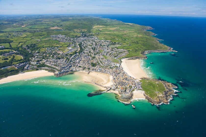 Aerial view of coastline of St Ives in summer sun Cornwall England UK United Kingdom GB