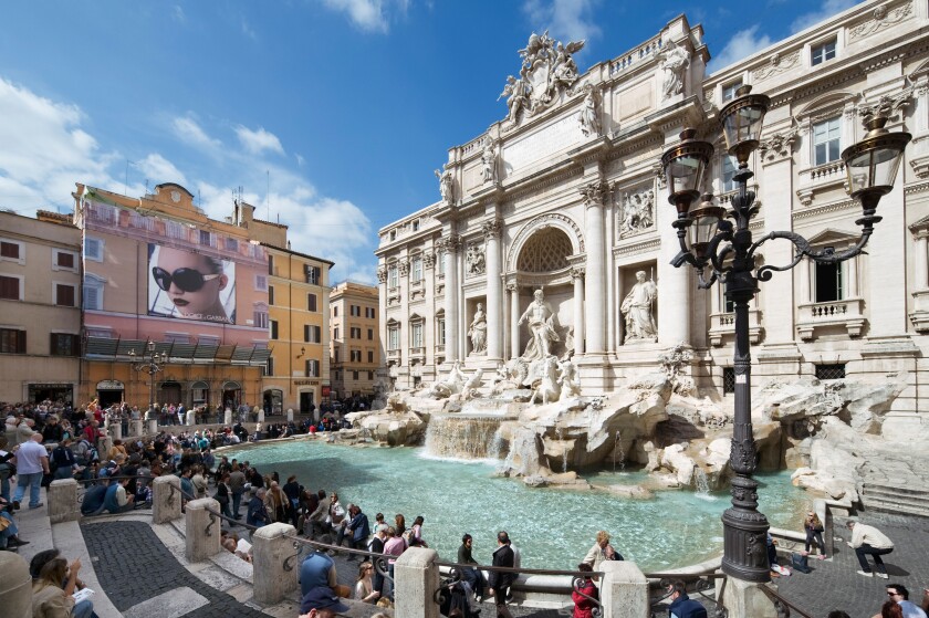Trevi Fountain, Rome. The Trevi Fountain or Fontana di Trevi with a billboard for Dolce e Gabbana sunglasses to the left, Rome, Italy. Image shot 03/2008. Exact date unknown.