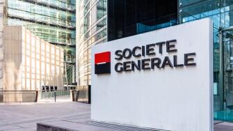 Sign of the Societe Generale at the entrance of the head office of the french banking group in La Defense business district.