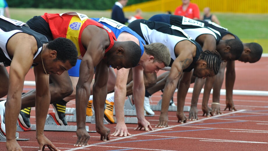 Runners on the start line of sprint race. Image shot 06/2009. Exact date unknown.