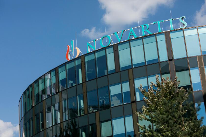 A logo sign outside of a facility occupied by Novartis in Vienna, Austria, on September 5, 2018.