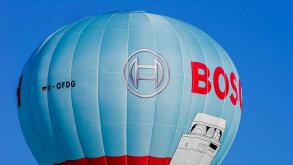 A hot air balloon, registered D-OFDG, takes to the skies during an air show on Rossfeld in Metzingen-Glems, Baden- Wuerttemberg, Germany.
