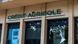 Narbona, France - June 18, 2024: Sign and logo of Credit Agricole bank office in Narbona or Narbonne, Occitanie, France