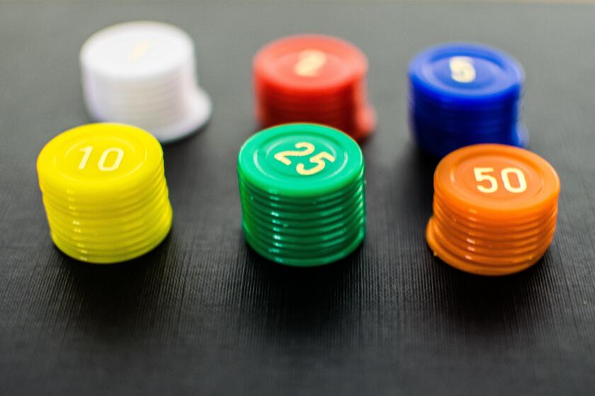 Close up of colored stacked casino chips