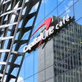 Logo of Capital One on the modern facade of a building.