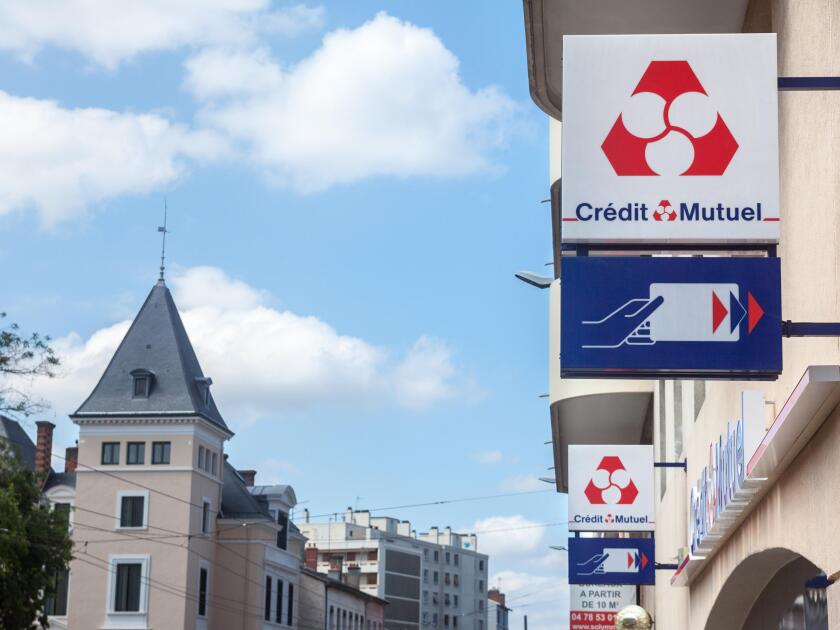 LYON, FRANCE - JULY 15, 2019: Credit Mutuel logo in front of their local bank in Lyon. Credit Mutuel is a cooperative bank, one of main french banks a