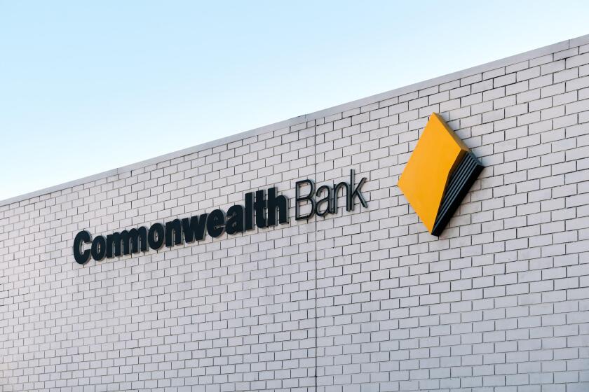 Adelaide, South Australia - August 17, 2019: Commonwealth Bank branch logo sign above the entrance near Unley shopping center
