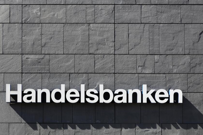 Aarhus, Denmark - May 1, 2016: Handelsbanken logo on a wall. Handelsbanken is a Swedish bank providing universal banking services