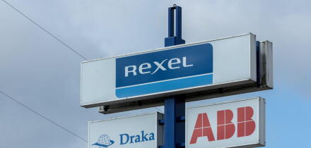 REXEL sign logo at a store. Rexel is the electrical wholesaler with electrical products for residential construction, industry, utilities.