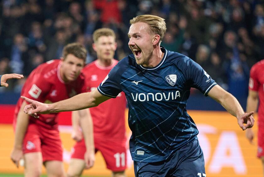 Bochum's Lukas Daschner celebrates scoring during the Bundesliga soccer match between VfL Bochum and 1. FC Koln at Vonovia Ruhrstadion, Bochum, Germany, Saturday Nov. 11, 2023. (Bernd Thissen/dpa via AP)