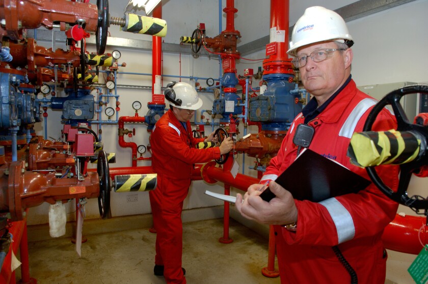 Technicians checking operations at Barry Power Station owned by Centrica.