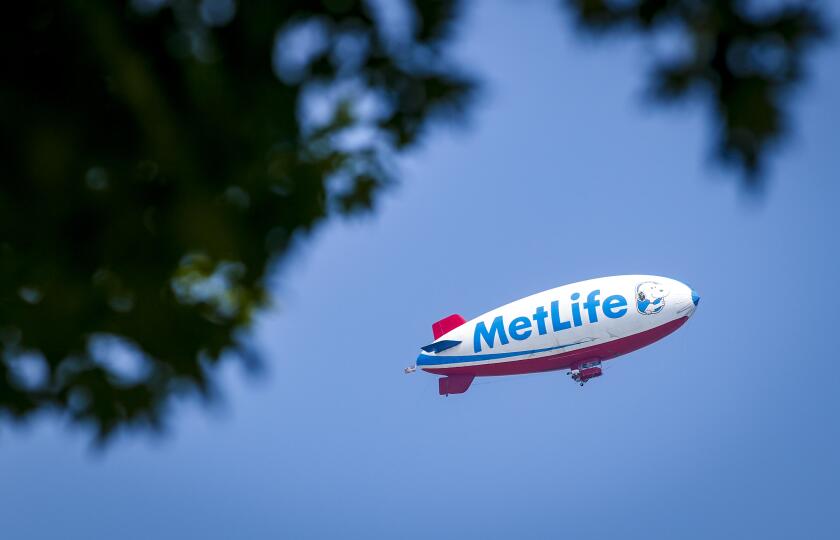 Davenport, Iowa, USA. 10th Aug, 2016. The MetLife blimp circles the course during the John Deere Classic Pro-Am in Silvis on Wednesday, August 10, 2016. Credit: Andy Abeyta/Quad-City Times/ZUMA Wire/Alamy Live News
