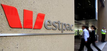 People walk past the headquarters of Westpac in Sydney, Australia, Wednesday, May 4, 2011. Westpac Banking Corp., one of Australia's largest lenders, said that its first-half profit rose 38 percent as bad debt charges fell. (AP Photo/Rick Rycroft)
