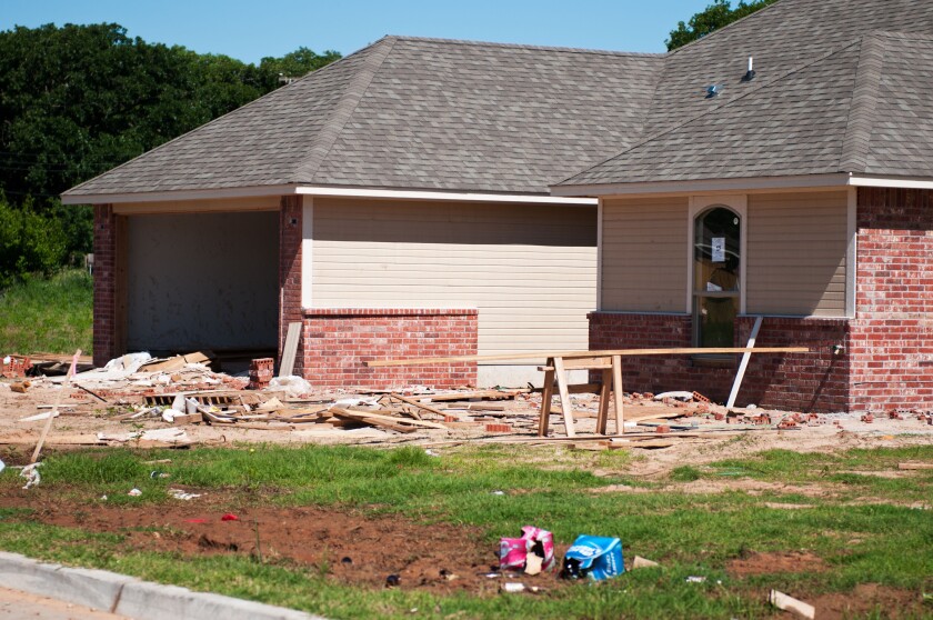 A new brick and frame house under construction in Oklahoma City, Oklahoma, USA