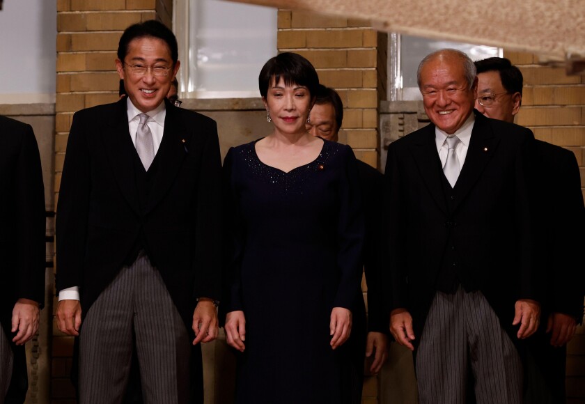 Tokyo, Japan. 10th Aug, 2022. Japan's Prime Minister Fumio Kishida (L), Minister in Charge of Economic Security Sanae Takaichi (C), Finance Minister Shunichi Suzuki and other ministers prepare for a photo session at Kishida's residence in Tokyo, Japan, Au