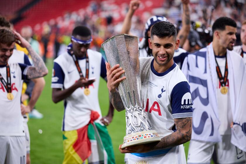 Players of Tottenham Hotspur FC celebrate with the trophy after winning during the UEFA Europa League 2024/25 Final match between Tottenham Hotspur and Manchester United at San Mames on May 21, 2025, in Bilbao, Spain. AFP7 21/05/2025 (Europa Press via AP)