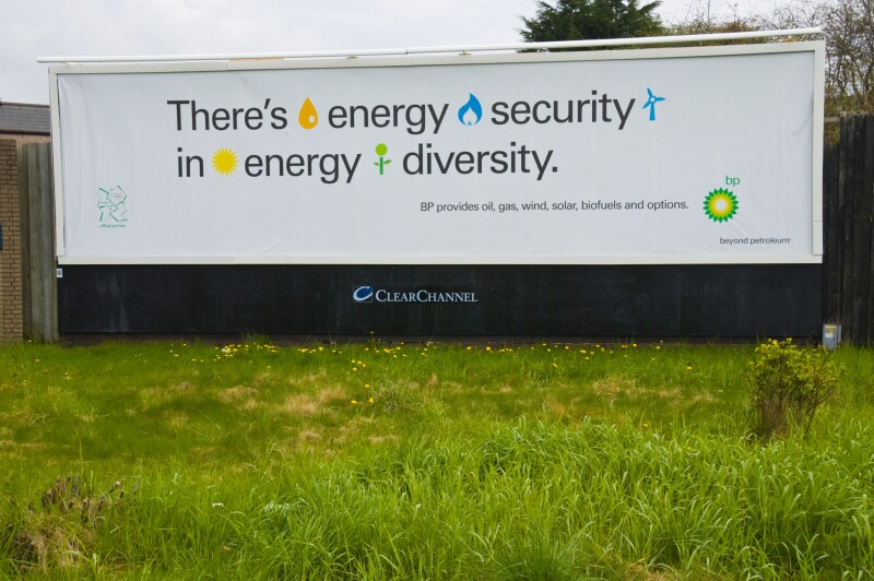 ClearChannel advertising billboard for BP on hoarding in Newport South Wales UK