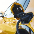Close up of power supply plugged into an electric car being charged using a rapid charger cable