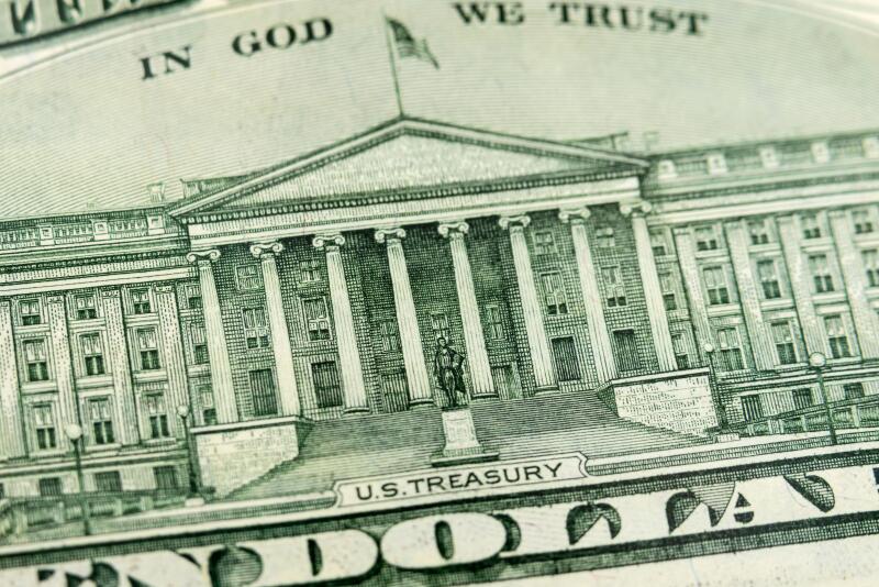 Macro close up of the US Treasury Building on the back of the US Ten Dollar Bill.
