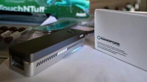Brno, Czechia - October 08, 2021: Small portable DNA flow cell sequencer manufactured by Oxford Nanopore technologies at display at army fair in medic