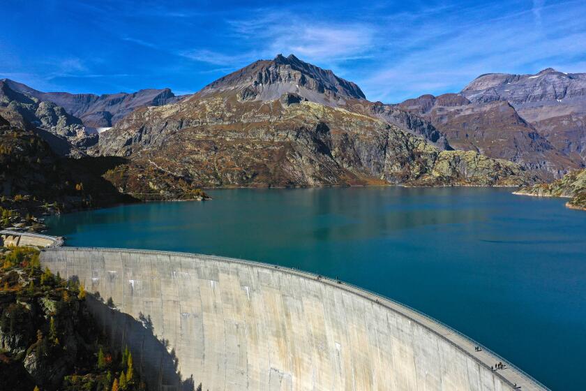 Emosson dam and water reservoir, Barrage d'Emosson, aerial shot, Finhaut, Valais, Switzerland