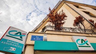 Credit Agricole and Banque Assurances signs on a building corner, Bourgogne-Franche-Comte, Dijon, France
