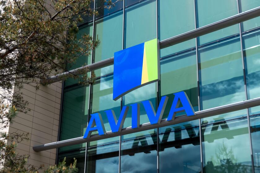Sign outside the building housing the headquarters of the insurance company Aviva France