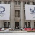 Tokyo, Japan. 25th July, 2019. Huge banners of Tokyo 2020 Olympic Games are on display outside Sumitomo Mitsui Trust Bank to promote the 2020 Tokyo Olympic and Paralympic Games. Tokyo marks one year to go 2020 Olympics decorating with Olympic emblems and 
