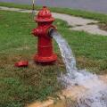 Open in industrial fire hydrant being sprayed strong water