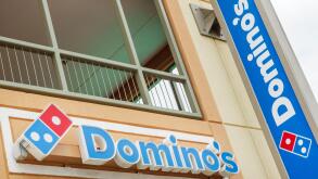 Orlando Florida,UCF University of Central Florida campus,Domino's Pizza restaurant,fast food chain,storefront signage logo,outside exterior,branding p