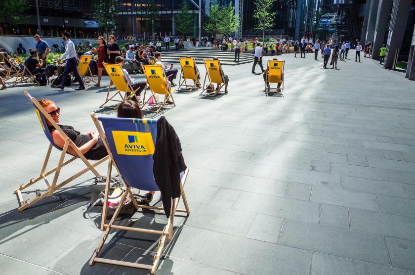 Aviva PLc HQ Headquarters London . Aviva sponsored deck chairs outside the Aviva St Helen's bldg, formerly Aviva Tower, St Mary Axe, City of London.