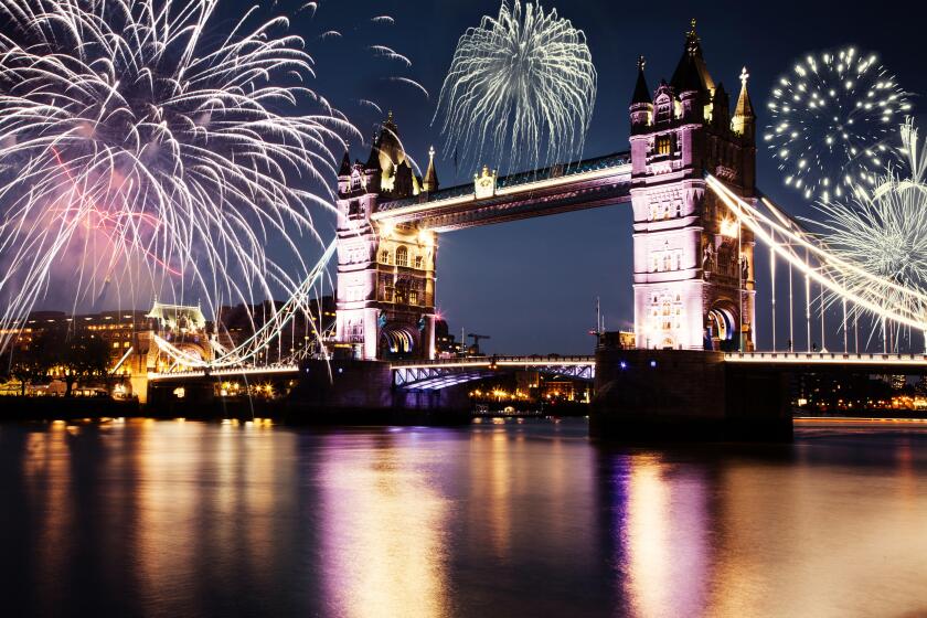 fireworks over the River Thames in London - celebrating New Year in the city