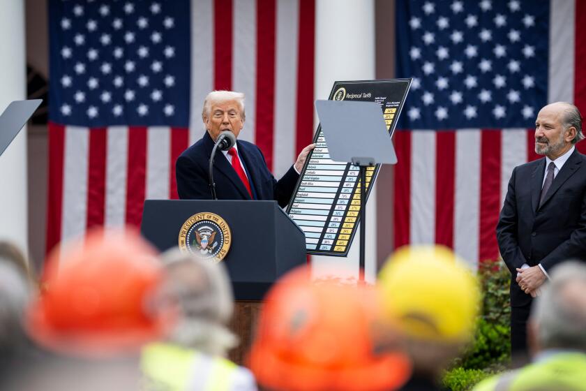 Washington, United States. 02nd Apr, 2025. U.S President Donald Trump holds a chart of global trade as he announces his tariff plan for all imported goods during his Make America Wealthy Again event at the Rose Garden of the White House, April 2, 2025 in 