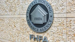 Washington DC, USA - July 3, 2017: Federal Housing Finance Agency seal in downtown with closeup of sign and logo