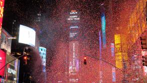 New York, United States. 01st Jan, 2026. A crowd of revelers celebrate under falling confetti after the New Year's Eve ball drop marked the start of 2026. Crowds gathered in Times Square, Manhattan, New York City to observe the New Year's Eve ball drop us