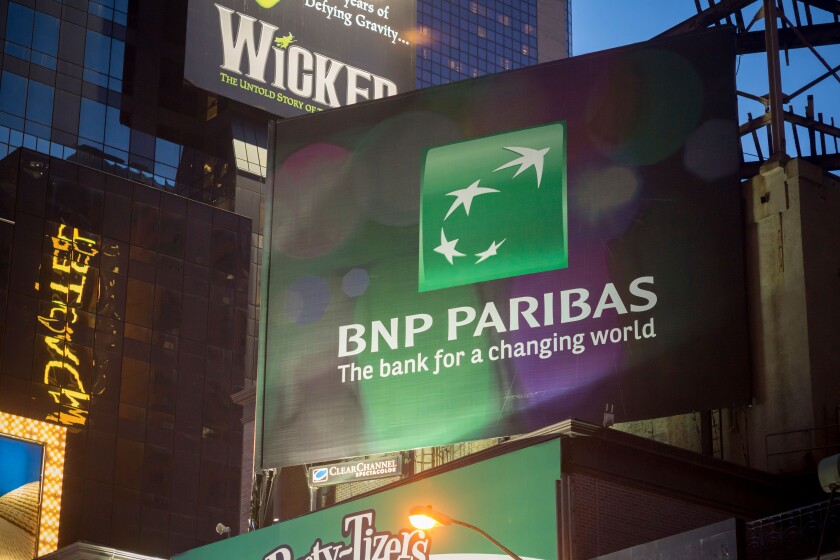 Advertising for the French bank, BNP Paribas, is seen in New York