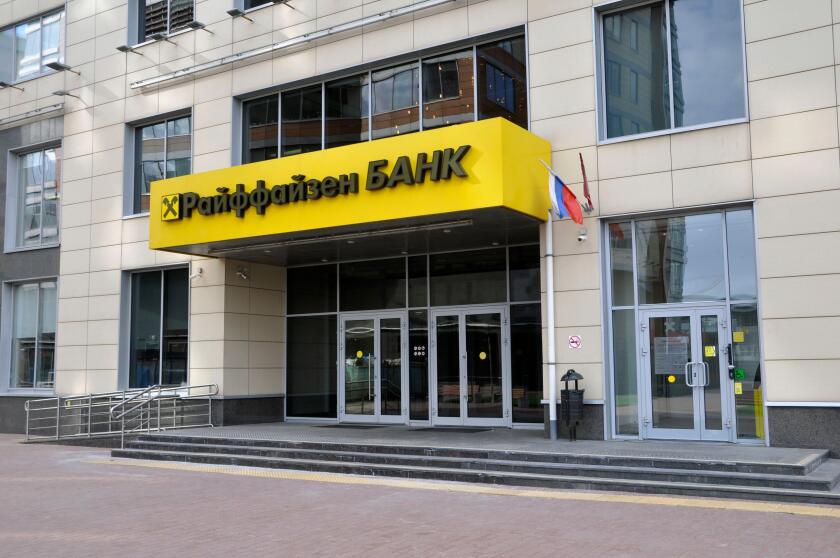 Moscow, Russia - May 1, 2022: Entrance group of Raiffeisen Bank branch in Moscow.