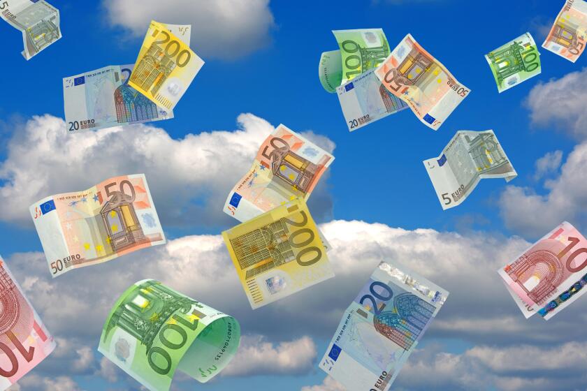 Flying banknotes on the sky